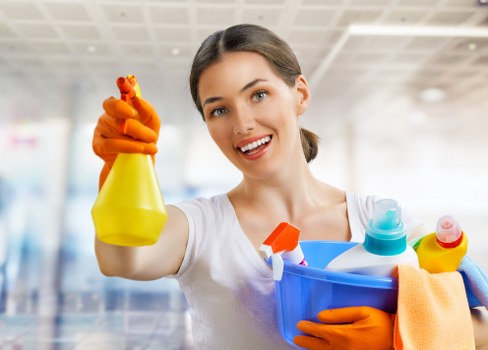 Trained carpet cleaning staff using protective equipment during a professional clean