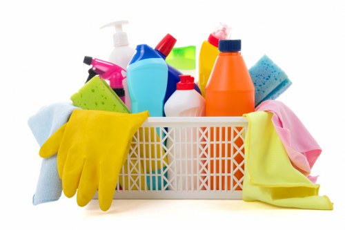 Professional carpet cleaning team working safely with insurance and PPE