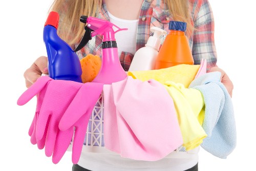 Office cleaners working in a modern SE18 business workspace